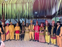 Prosesi Olongian Tialo Sambut Bupati dengan Penuh Makna