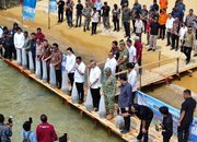 Bupati Poso dan Gubernur Sulteng Tebar Benih Nila di Danau Poso